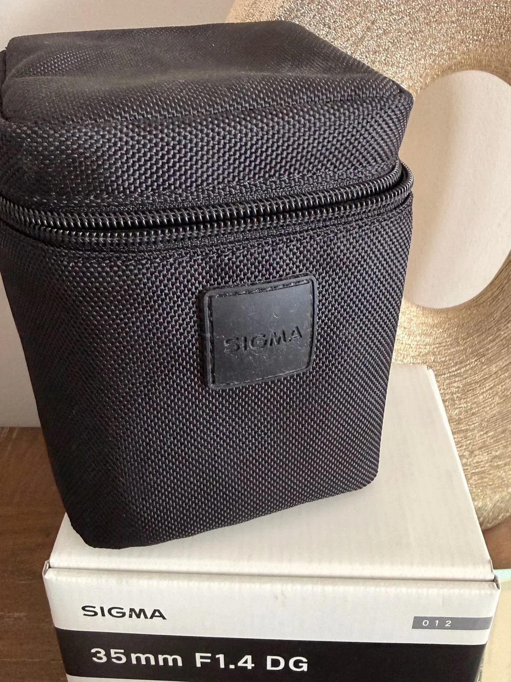 Sigma Beauty 35mm f/1.4 DG Lens in Black with Black Case